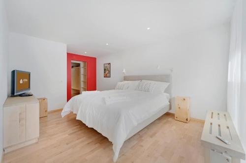 Postel nebo postele na pokoji v ubytování LOGA ELEGANCE APARTMENT Skyline 1 - St. Moritz