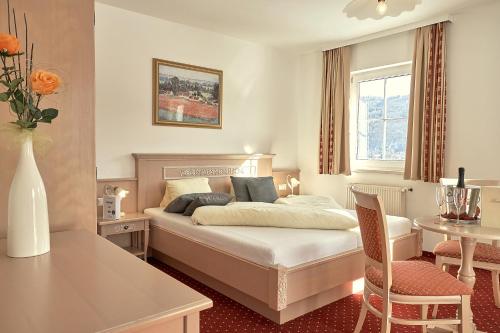 Кровать или кровати в номере Hotel Sonnenhügel - Все включено
