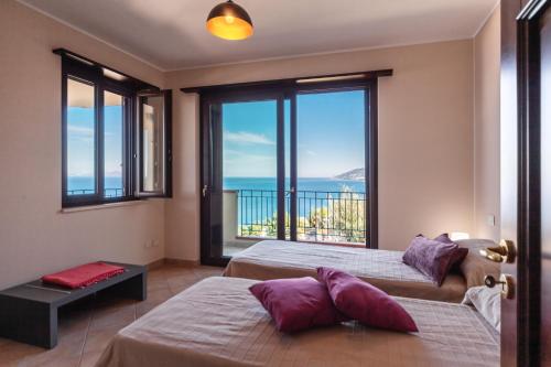 Ліжко або ліжка в номері Villa d'Orlando Charme - with private pool and sea view