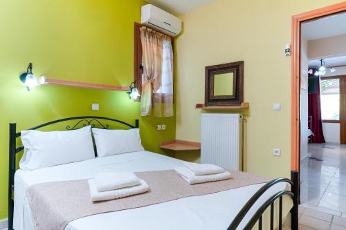 Postel nebo postele na pokoji v ubytování Villa Golden Nest