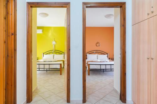 Postel nebo postele na pokoji v ubytování Villa Golden Nest