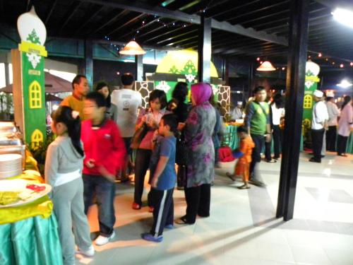 a group of people standing around in a store at Hotel Sibayak Internasional in Berastagi