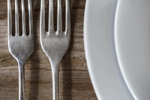 a group of forks sitting on top of a table at Saltmarsh Farmhouse in West Dean