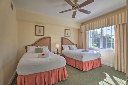 a bedroom with two beds and a window at Luxury 3BR Reunion Resort Condo Near Disney Golf & Pools in Kissimmee