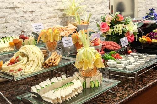 a buffet of food on display on a table at Grand Yavuz Hotel Sultanahmet in Istanbul
