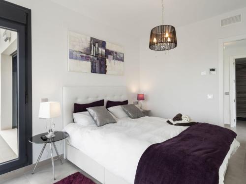 Postel nebo postele na pokoji v ubytování Belvilla by OYO Casa Bali 11