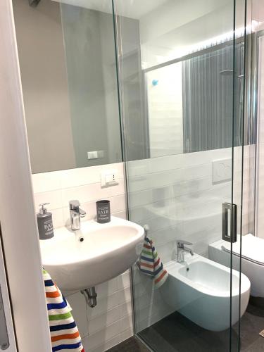 a bathroom with a sink and a mirror at I Pittaneri in Catania