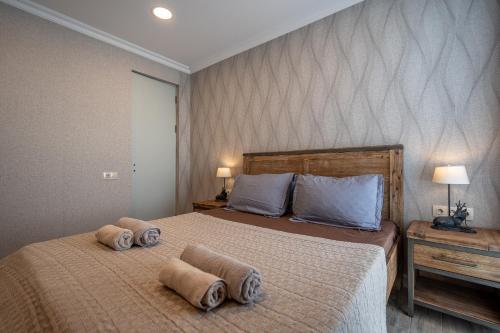 Ένα ή περισσότερα κρεβάτια σε δωμάτιο στο Alpine Valley - New Gudauri