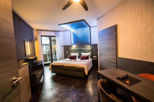 Postel nebo postele na pokoji v ubytování premium by GS Hotel