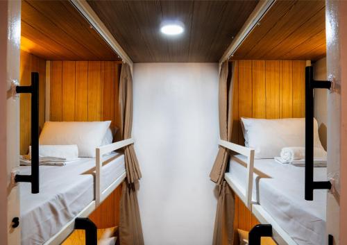 Postel nebo postele na pokoji v ubytování B&B Backpackers