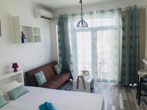 Cama ou camas em um quarto em Studio- Grand Bay- 30 Meters from the Beach