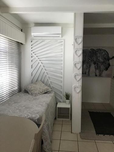 Ένα ή περισσότερα κρεβάτια σε δωμάτιο στο White River B & B