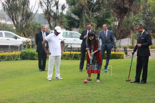 a group of people playing a game of croquet at Savoy - IHCL SeleQtions in Ooty