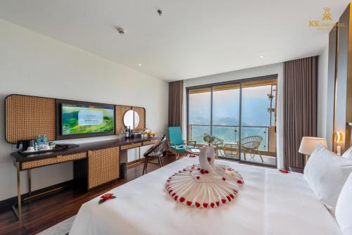 Ένα ή περισσότερα κρεβάτια σε δωμάτιο στο KK Sapa Hotel