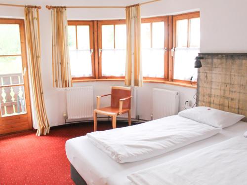 Postel nebo postele na pokoji v ubytování Chalet Rotenstein