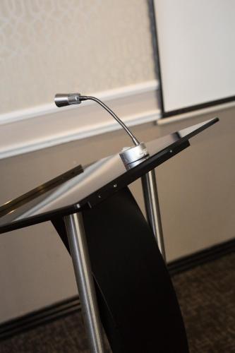 a microphone sitting on top of a podium at Premier Hotel Midrand in Midrand