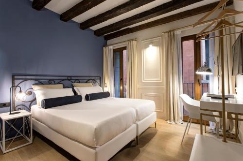 Posteľ alebo postele v izbe v ubytovaní San Marco Suite 755