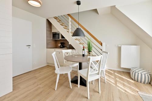 Кухня или мини-кухня в Hotel- & Ferienanlage Kapitäns-Häuser Breege
