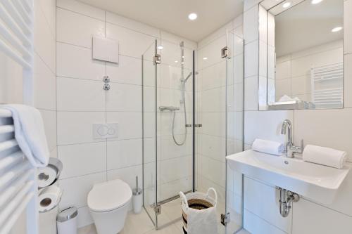 Ванная комната в Hotel- & Ferienanlage Kapitäns-Häuser Breege