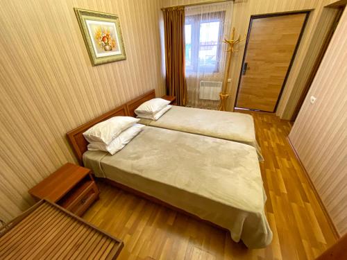 Ліжко або ліжка в номері Na Plyazhe House