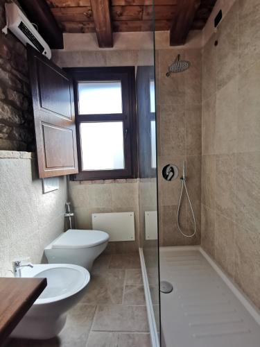 Ванная комната в L'Antica Dimora - Suites & Apartments