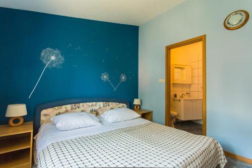 Postel nebo postele na pokoji v ubytování Apartments Bilaja