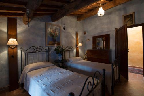 Postel nebo postele na pokoji v ubytování Casa Benoi