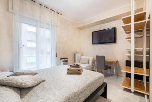 Postel nebo postele na pokoji v ubytování Gold House 2