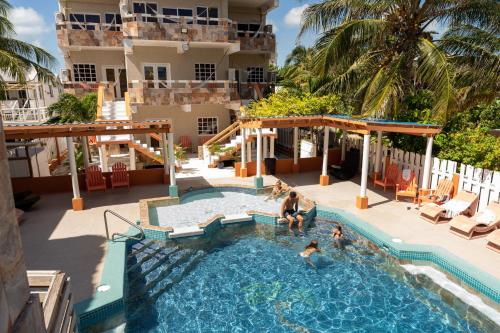an aerial view of a swimming pool at a hotel at Island Magic Beach Resort in Caye Caulker