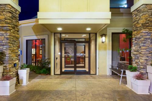a lobby of a hotel with a building at Holiday Inn Express Roseburg by IHG in Roseburg