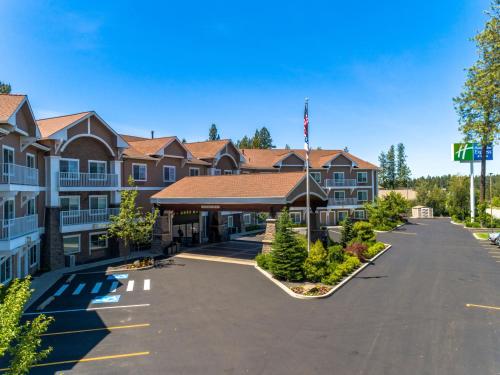 an empty parking lot in front of a building at Holiday Inn Express Hotel & Suites Coeur D'Alene I-90 Exit 11 by IHG in Coeur d'Alene