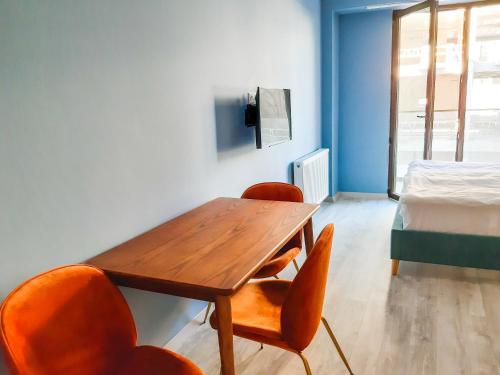 TV a/nebo společenská místnost v ubytování Новый Гудаури Loft 2