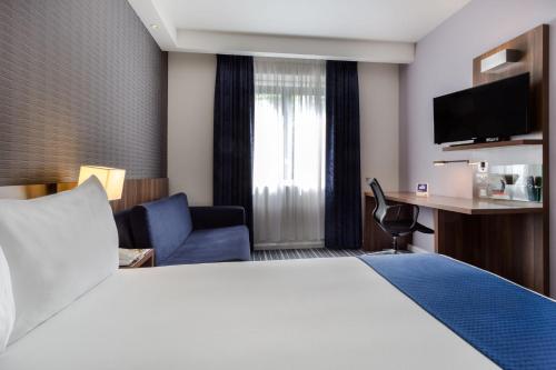 Ένα ή περισσότερα κρεβάτια σε δωμάτιο στο Holiday Inn Express Colchester by IHG