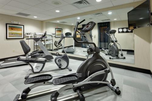 a gym with cardio equipment in a hotel room at Holiday Inn Express & Suites Northeast by IHG in York
