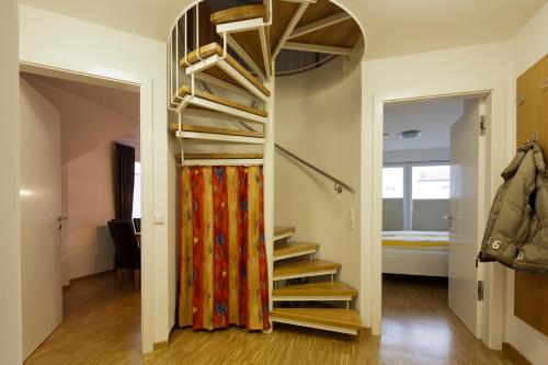 Postel nebo postele na pokoji v ubytování Apartments Boardinghaus Norderney