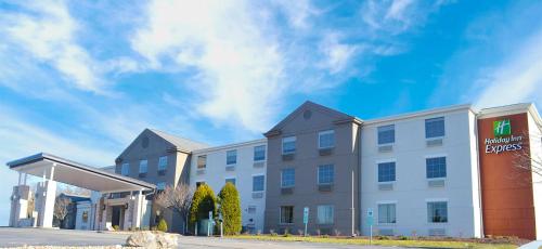 a rendering of a hotel with a building at Holiday Inn Express Pittsburgh-Bridgeville by IHG in Bridgeville