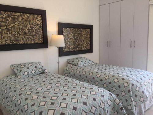 Een bed of bedden in een kamer bij Moderna Suite Privada Alberca Av B Quintana 29C