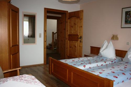 Ein Bett oder Betten in einem Zimmer der Unterkunft Haus Ampferstein