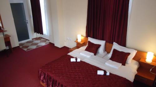 Ένα ή περισσότερα κρεβάτια σε δωμάτιο στο Villa Bastion