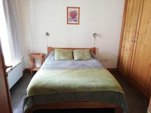 מיטה או מיטות בחדר ב-Cabañas Matilde 7