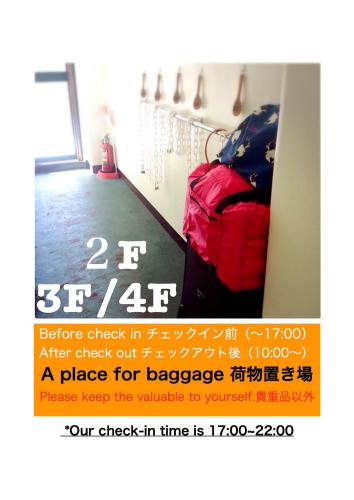 a advertisement for a bag of luggage in a room at Takamatsu Guesthouse BJ Station in Takamatsu