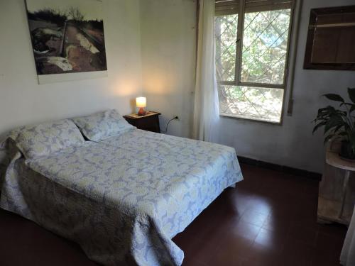 A bed or beds in a room at Bosquecito Del Rio
