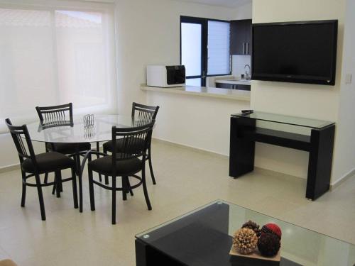 TV a/nebo společenská místnost v ubytování Suite Comfort Ideal Alberca Av Bernardo Quintana 24C