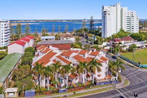 an aerial view of a house with palm trees at Santa Fe by the Broadwater in Gold Coast