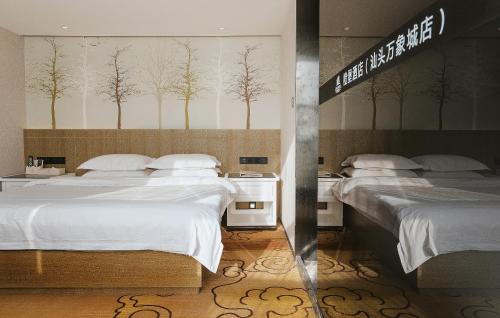 Krevet ili kreveti u jedinici u okviru objekta Cheng Bao Hotel Shantou Mixc Branch