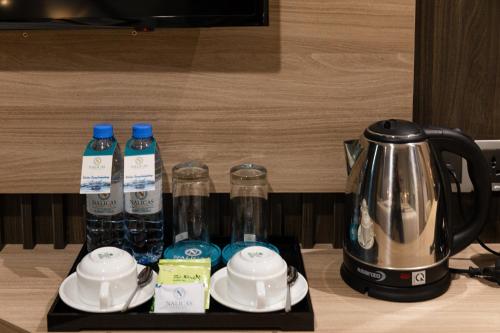 Příslušenství pro přípravu čaje a kávy v ubytování Nalicas Nha Trang Hotel