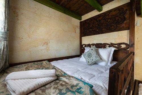 Een bed of bedden in een kamer bij Cozy Rooms Goreme