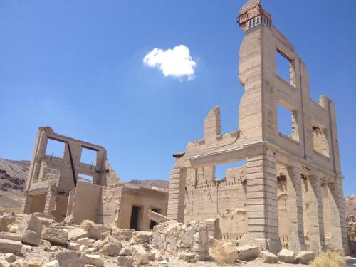 an old building with a tower in the desert at Holiday Inn Express & Suites Pahrump by IHG in Pahrump