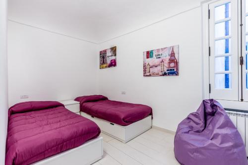 Posteľ alebo postele v izbe v ubytovaní Elegant House Via Pia