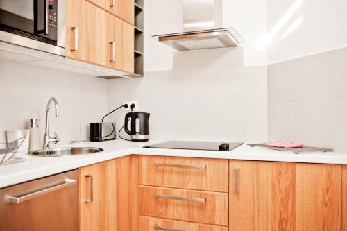 Kuchyňa alebo kuchynka v ubytovaní Apartament Alexandra